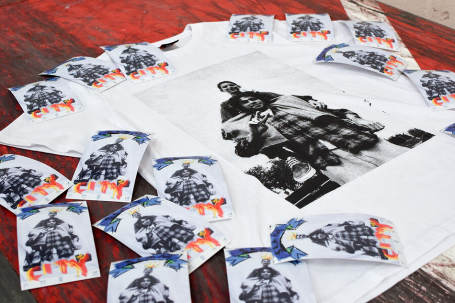 The 'Gonz and Toby' t-shirt and sticker featuring a Thomas Campbell photo of a young Toby Shuall on Mark Gonzales' shoulders.