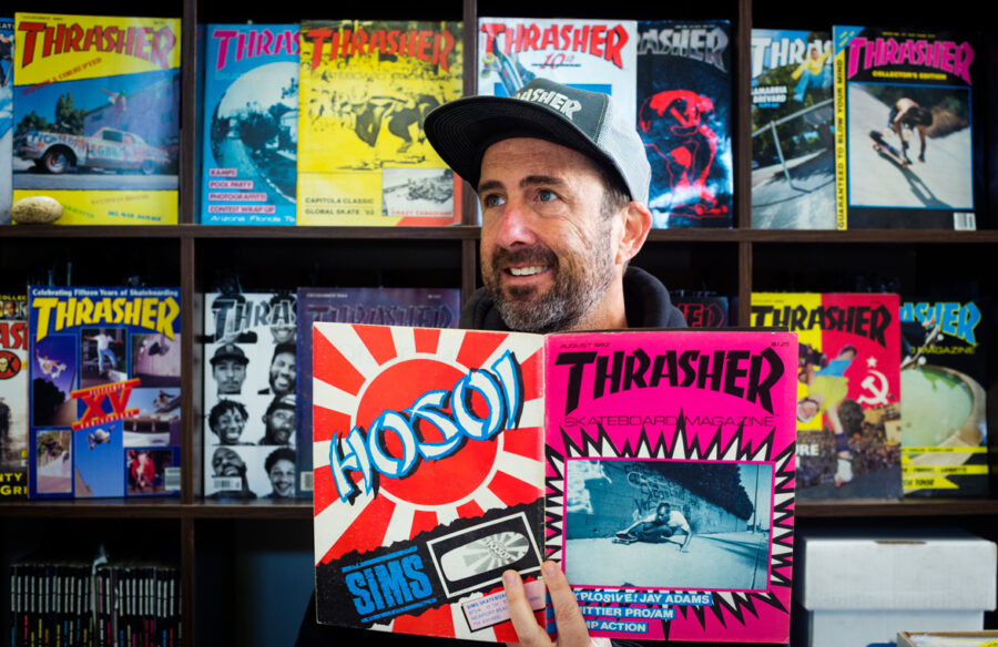 Thrasher Magazine editor Michael Burnett surrounded issues of the publication.