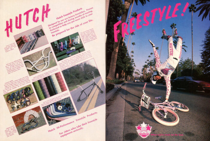 A BMX rider performancing a one handed handstand on top of his bike in an advert for Hutch.