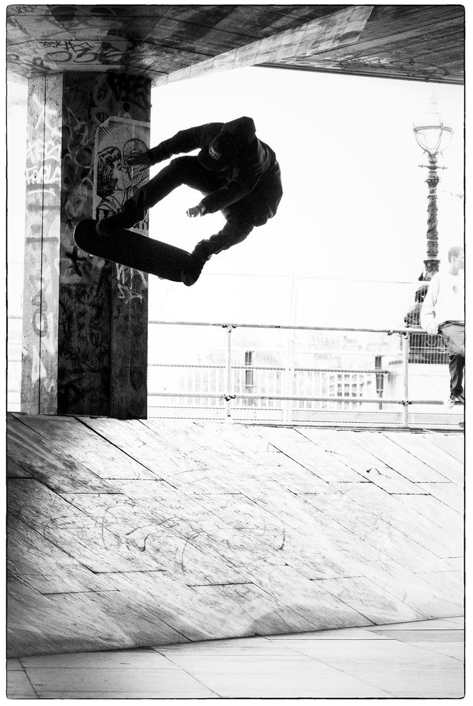 Paul Shier nollies out of a wallride on one of Southbank's sacred pillars for Andy Horsley's lens