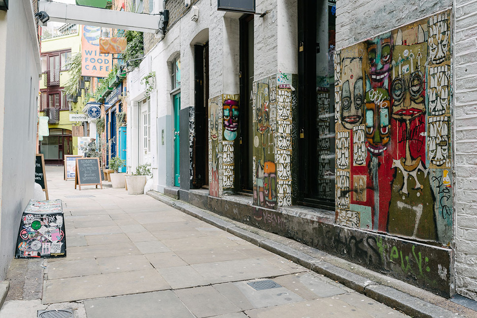 Slam City Skates in Neal's Yard with the iconic Phil,Frost artwork outside