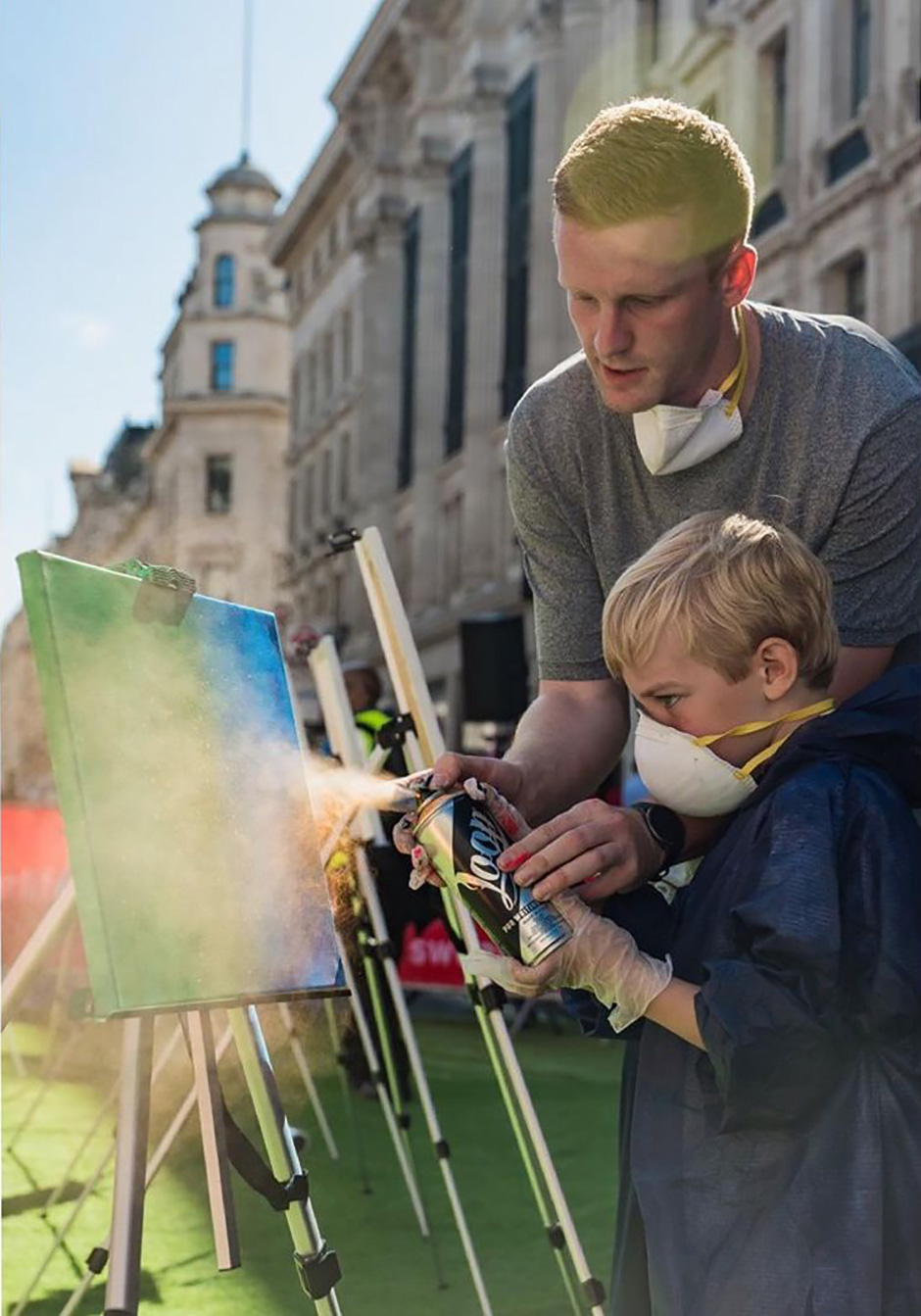 Jeremy Jones Spreading the joy of spray paint liberation. Graffik gallery workshop on Regent Street