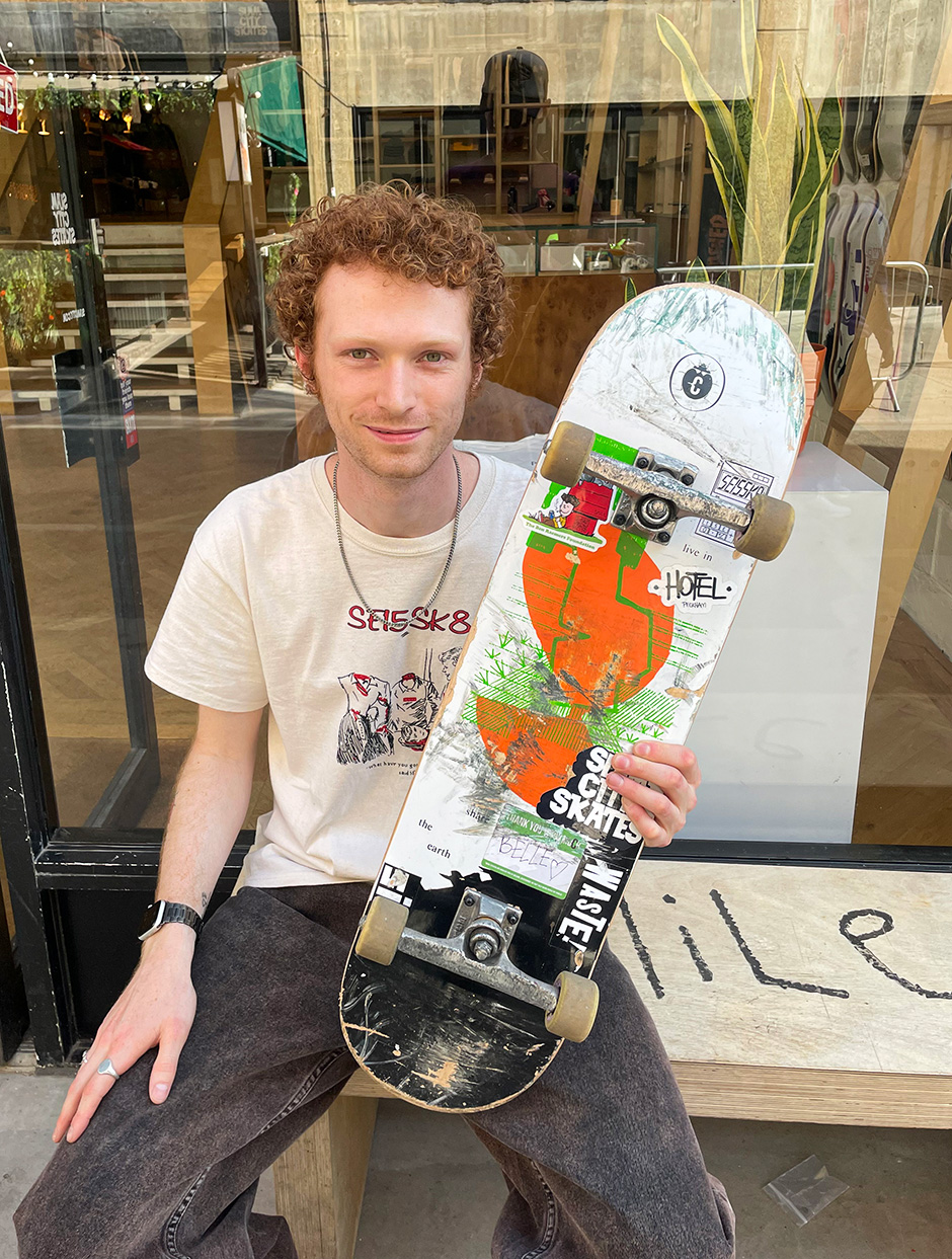 Tygar Miles Smith and one of the Clown boards he designed in front of our East London shop