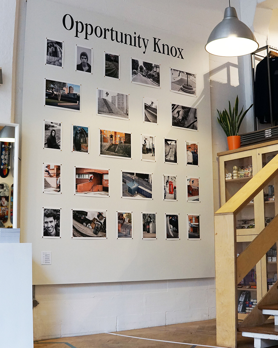 Photography wall inside the shop featuring more than a decade of Tom Knox hits