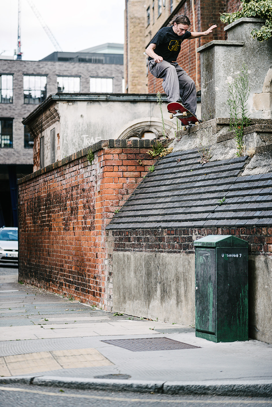 Zach Riley take a precarious 5-0 grind and prepares for the plunge. Rich West shoots