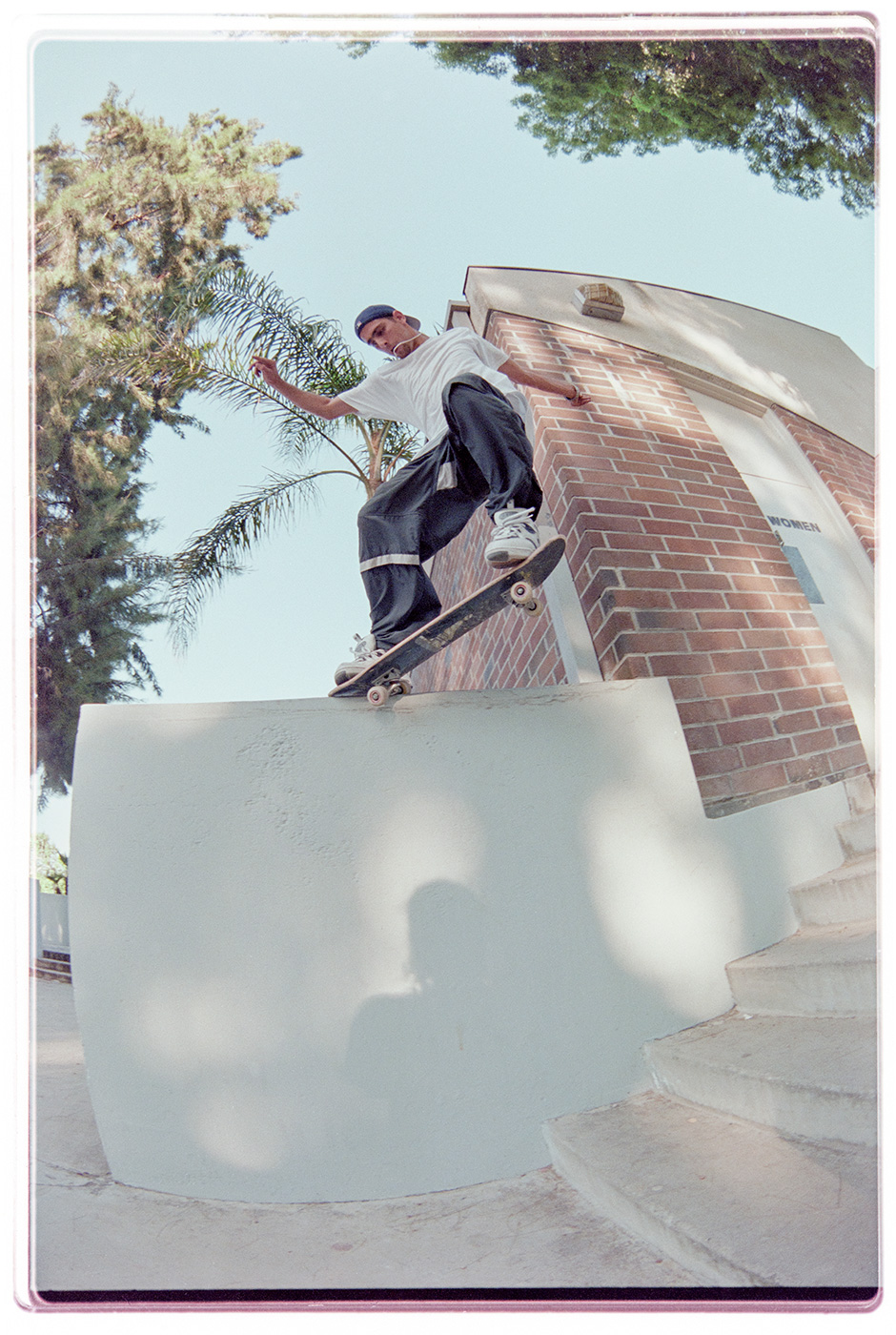 Guy Mariano switch crooked grinds the Tampa Ledge in LA for Mike Blabac's lens in 1998. This was Jack Curtin's photo pick for his 