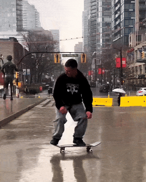 Spencer Hamilton at home in Vancouver, rainy day-fakie manny-fakie tre