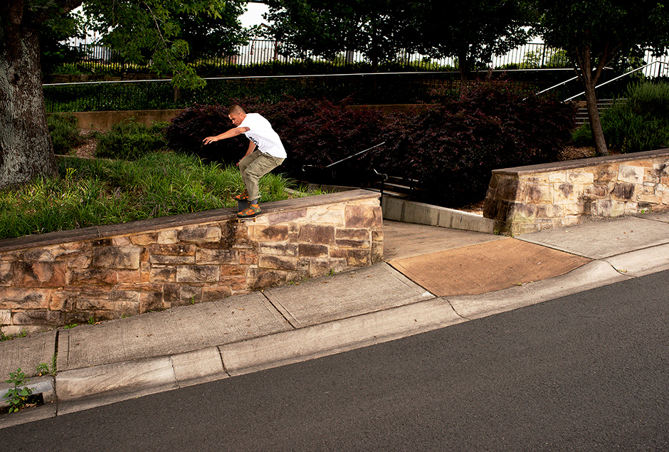 Jason Rainbird gaps out to lipslide in the Blue Mountains before hill bombing away. Photo shot by Sam Coady and selected by Trent Evans for his Slam City Skates 5000 Words interview