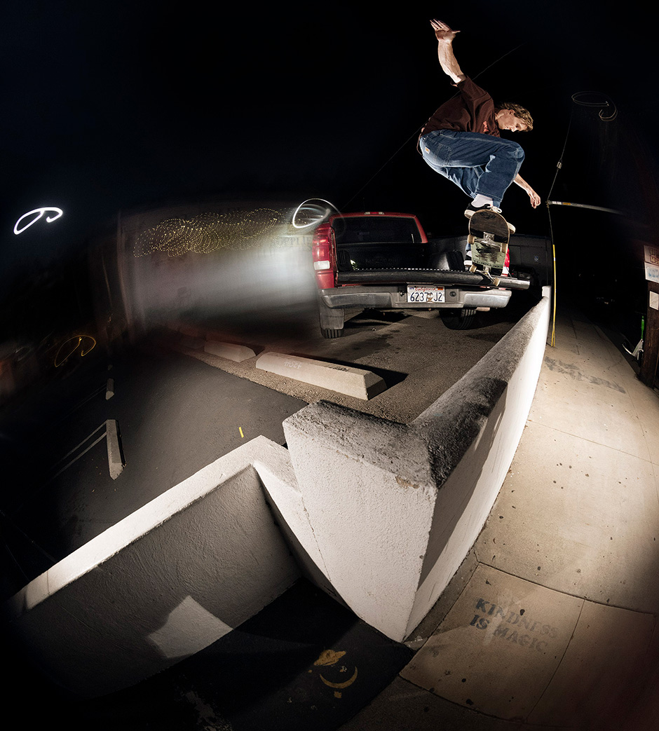 Josh Pall Crooked grinds the bumper of his own car out in LA. Photo shot by Andrew James Peters and selected by Trent Evans for his Slam City Skates 5000 Words interview