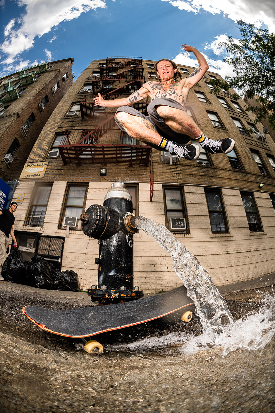 Barney Page hippy jumps the jet from a fire hydrant in NYC. Photo shot by Kyle Seidler and selected for his Slam City Skates 5000 Words interview