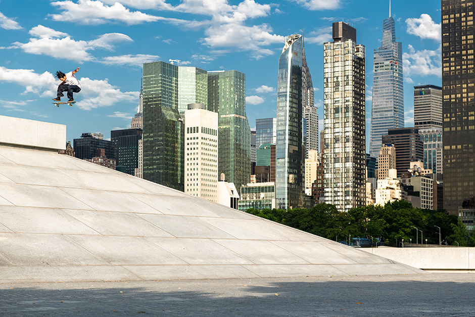 Julian Lewis with a lofty fakie flip on the forbidden ground of Roosevelt Island. Photo shot by Kyle Seidler and selected for his Slam City Skates 5000 Words interview