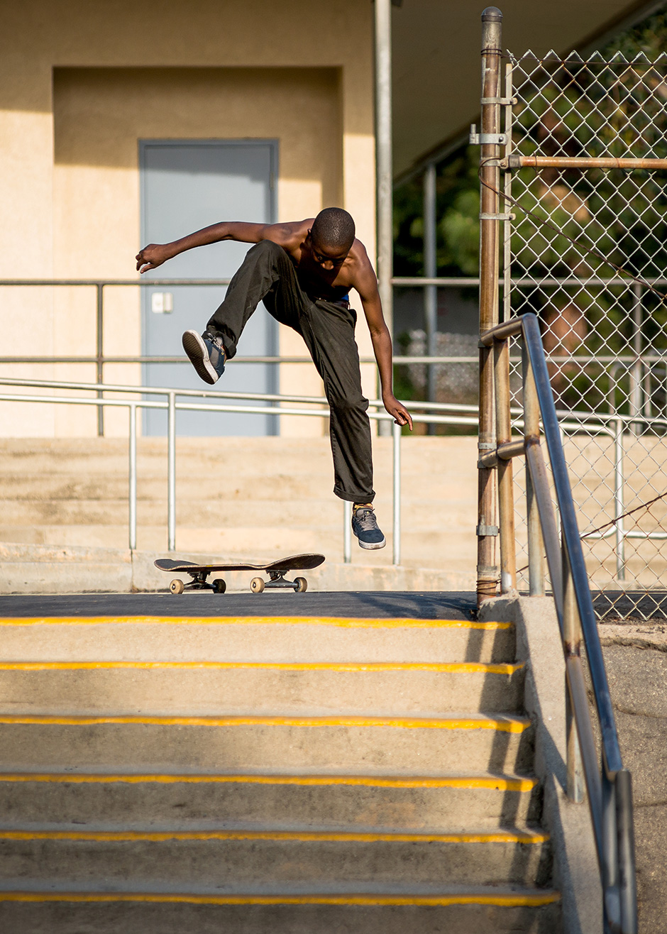 Kader Sylla celebrates landing a trick by employing some added gravity to focus his board. Photo shot by Kyle Seidler and selected for his Slam City Skates 5000 Words interview
