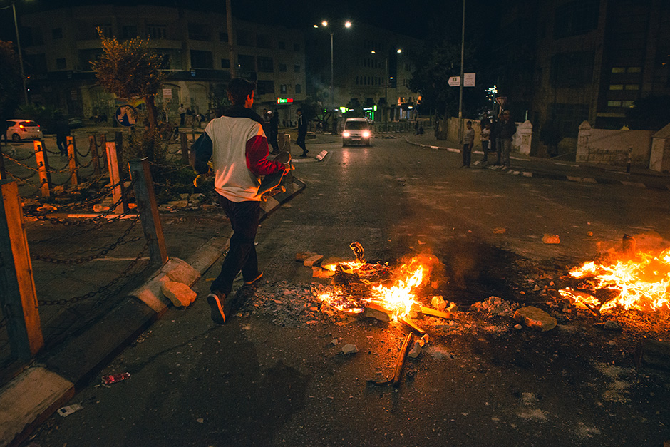 Ryan Lay on the Ramallah streets in Palestine. Photo shot by Kyle Seidler and selected for his Slam City Skates 5000 Words interview