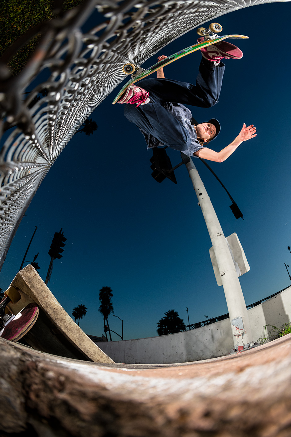 Sarah Meurle riding the chain link fence. Photo shot by Kyle Seidler and selected for his Slam City Skates 5000 Words interview