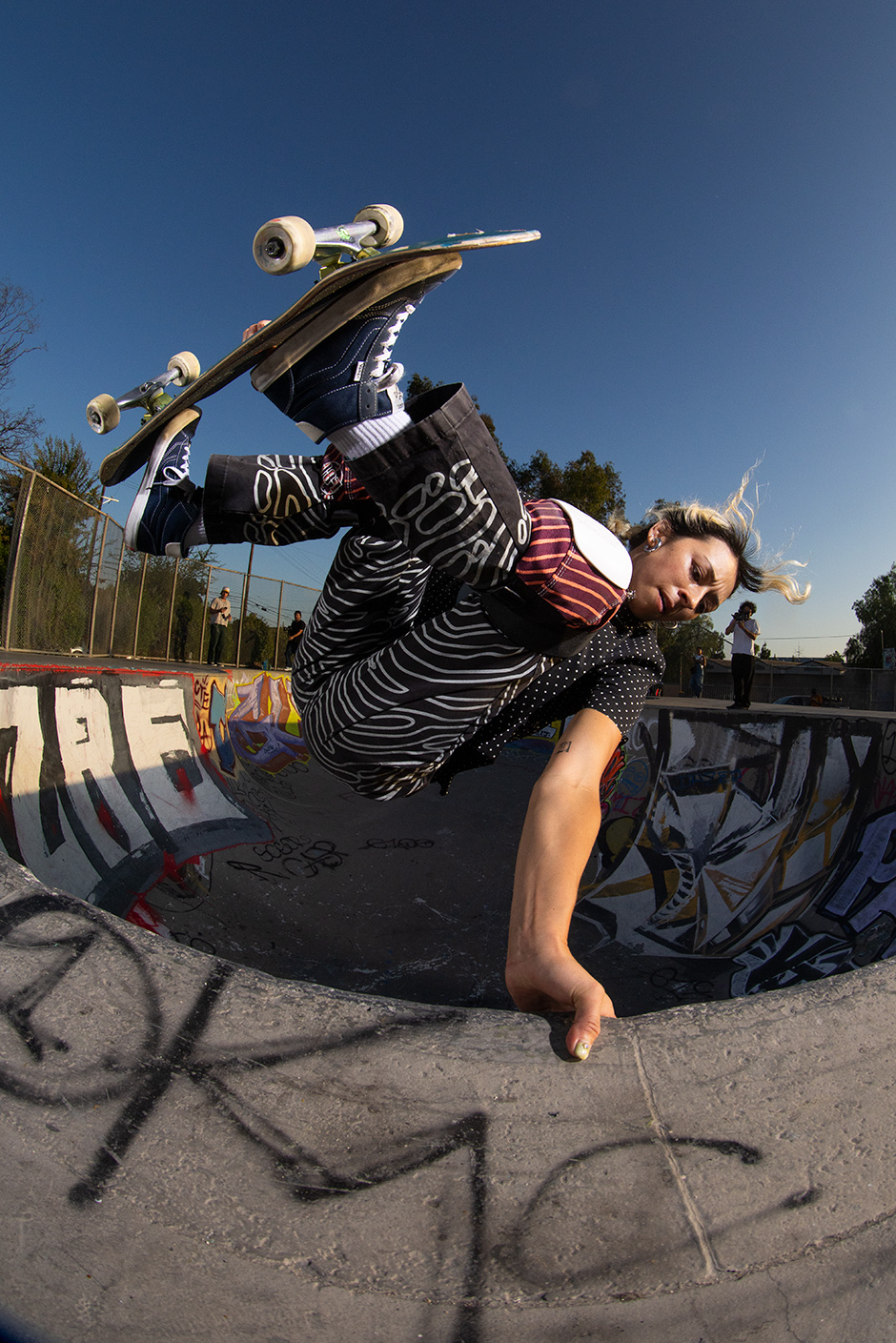 Lizzie Armanto frontside inverts at G-Park in 2025. Photo shot by Atiba Jeffesron and selected for his Slam City Skates 5000 Words interview