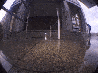 Pat Coghlan boosts a healthy hippy jump before employing his quick feet to kickflip some stairs for Jude Harrison's