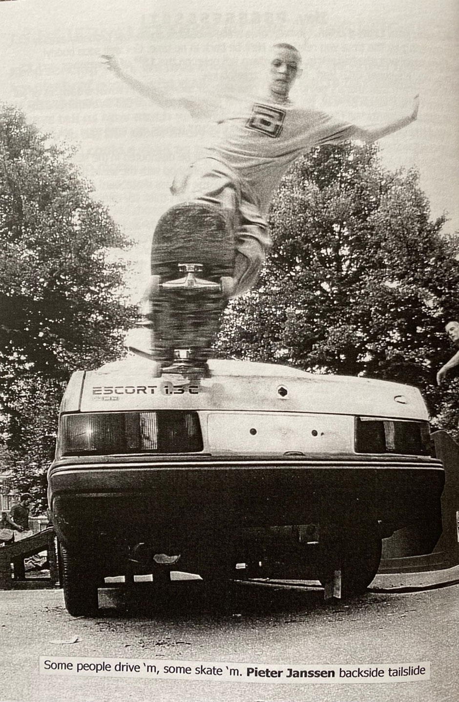 Piet backside tailslides a Ford Escort boot in the Colorblind era, shot by Marcel Veldman