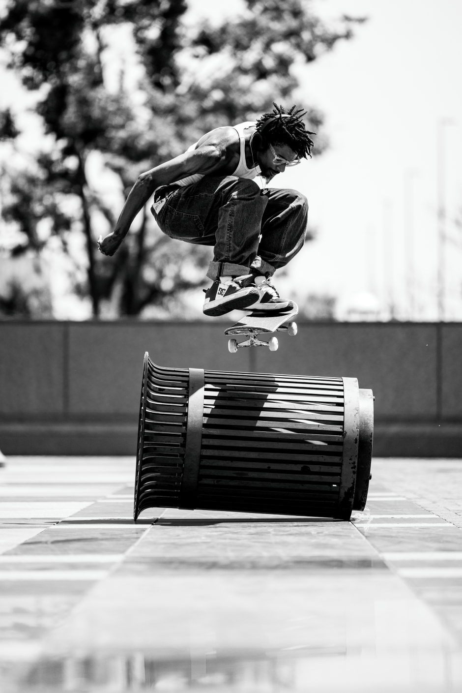 Jahmir Brown nollie shuvs a Texas trashcan for the lens of Mike Heikkila