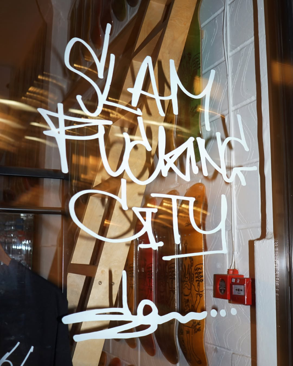 Slawn's handstyle on the window of our East London shop announcing our Slam City Skates X Slawn capsule